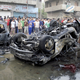 Baghdadis gather round the wreckage to remark on how much more gory the explosions clearly could have been.